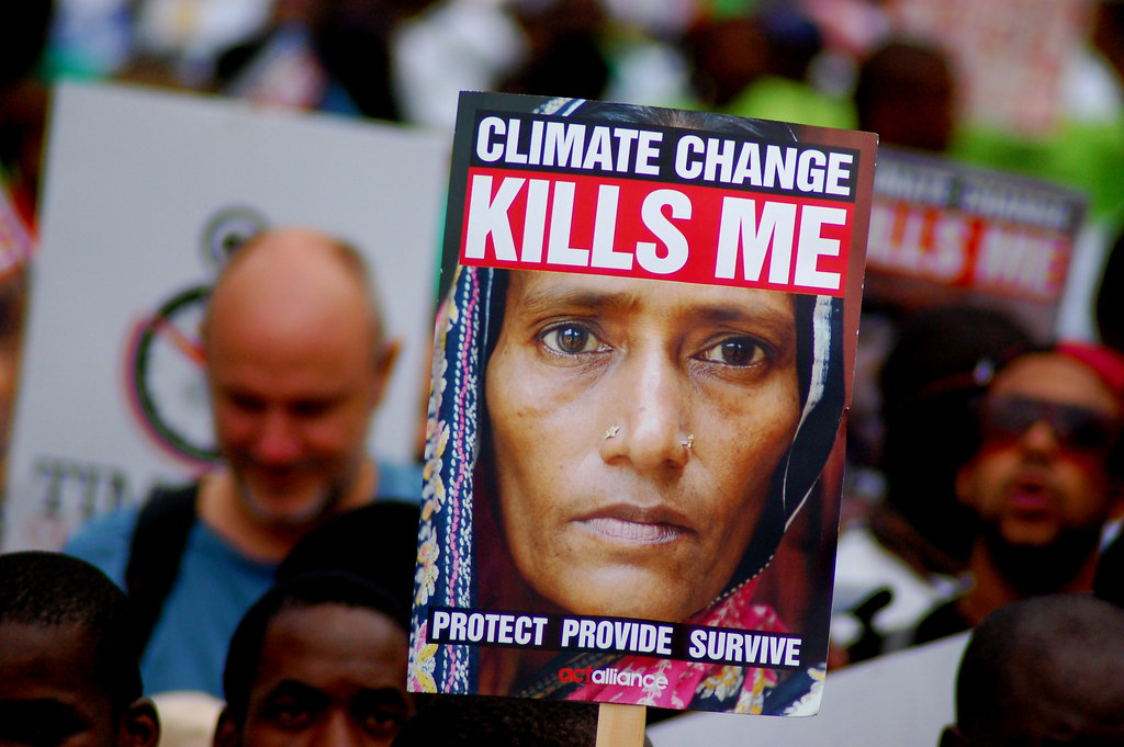 Climate Change Kills Me Banner