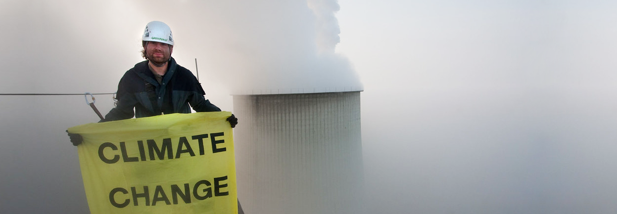 Climate Change banner against puttering cooling tower