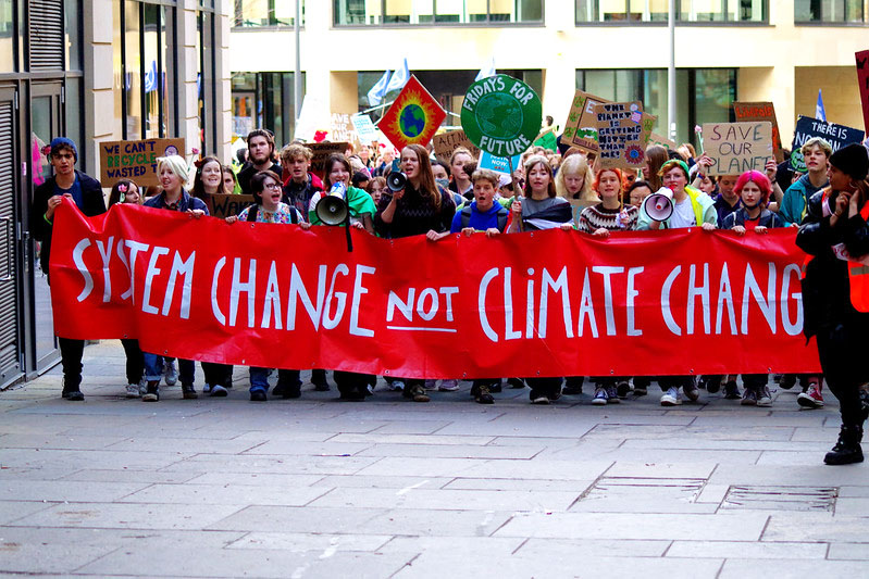 System change not climate change banner